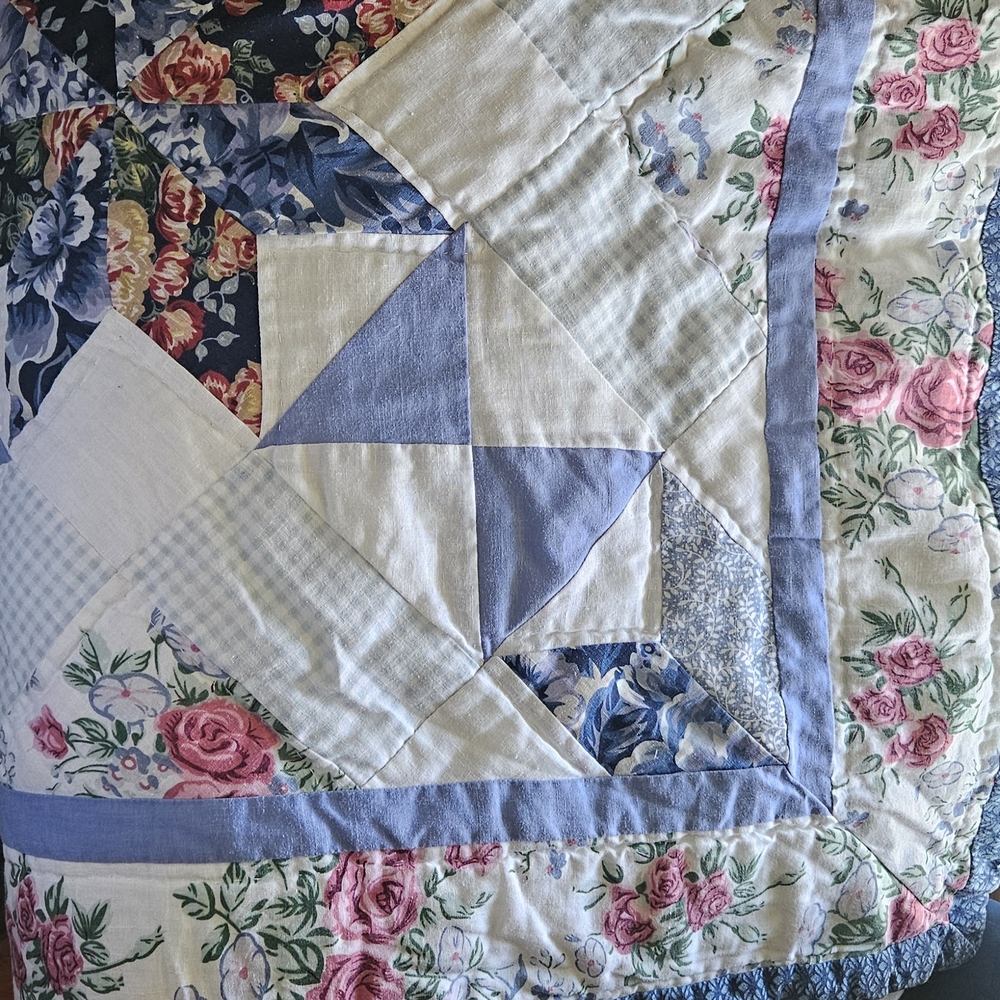 Floral Patchwork Quilt with Blue and Pink Accents